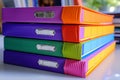 Office essentials Multi colored file folders neatly stacked on a table Royalty Free Stock Photo