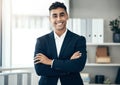 Office, finance and proud business man in company portrait for job motivation, career goals and leadership with a smile