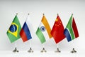 Office flags of the BRICS countries on a light background. Summit of Brazil, Russia, India, China and South Africa.