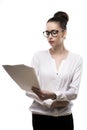 Office girl in glasses holds papers in hands isolated on white Royalty Free Stock Photo