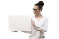 Office girl holds in hands blank white plate on a white background