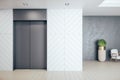 Office hall with elevator, furniture and daylight Royalty Free Stock Photo