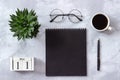 Office or home table desk. Wooden cubes calendar May 11. Black notepad, cup of coffee, succulent, glasses on marble background Royalty Free Stock Photo