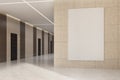 Office or hotel lobby with a poster on beige wall Royalty Free Stock Photo