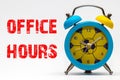 Office hours on a white background. Retro alarm clock Royalty Free Stock Photo