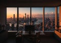Office interior with a panoramic view of a cityscape at sunset, Royalty Free Stock Photo