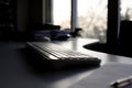 Office Keyboard with Sunset View Through Window Royalty Free Stock Photo