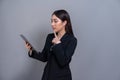 Office lady make hand holding gesture for advertisements with laptop. Jubilant