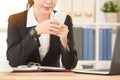 Office lady using mobile phone playing online game Royalty Free Stock Photo