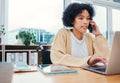 Office, laptop and woman with phone call in wheelchair typing at a desk with company report. Online, computer and female