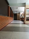 Office lobby interior with wooden walls and large white space. Concept of business building. 3d rendering. Mock up Royalty Free Stock Photo