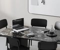 Office meeting room with long conference table and chairs, laptop and notebooks, whiteboard with notes on the wall, 3d render Royalty Free Stock Photo