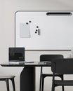 Office meeting room with long conference table and chairs, laptop and notebooks, whiteboard with notes on the wall, 3d render Royalty Free Stock Photo