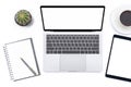 Mockup image of modern white office desk with laptop computer with blank screen, mobile digital tablet, Royalty Free Stock Photo