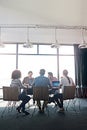 Office movers and shakers. a group of coworkers having a brainstorming session in an office boardroom.