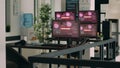IT office with multiple monitors showing critical error message flashing on screens Royalty Free Stock Photo