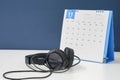 Office November calendar and headset Royalty Free Stock Photo