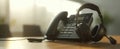 The office phone and headset ready for professional communication and support..AI generated image Royalty Free Stock Photo