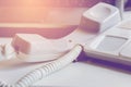Office phone,telephone handset off the hook on desk Royalty Free Stock Photo