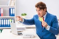The office prank with kick me message on sticky note Royalty Free Stock Photo