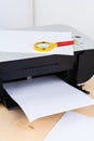 Office printer close up on a wooden table Royalty Free Stock Photo