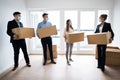 Office Relocation. Executives Moving Cardboard Boxes