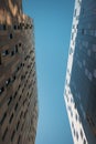 Office and residential skyscrapers on clear blue sky. Commercial real estate and modern business city district. Royalty Free Stock Photo