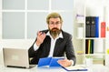 Office routine. mature school teacher. Business-minded businessman. bearded man in jacket with laptop. boss in workplace