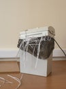 office shredder filled with sliced paper