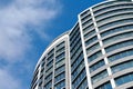 Office skyscraper high business building on blue sky background, looking up to glass modern building Royalty Free Stock Photo