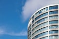 Office skyscraper high business building on blue sky background, looking up to glass modern building Royalty Free Stock Photo