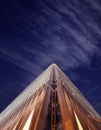 Office skyscraper, low angle, night time Royalty Free Stock Photo
