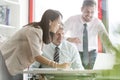 Smiling business people in meeting at office desk Royalty Free Stock Photo