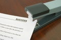 Office stapler and document Royalty Free Stock Photo