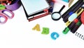 Office and student accessories on a white. Back to school concept. Royalty Free Stock Photo