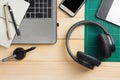 Office stuff and gadgets on wooden desk