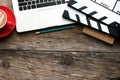 Office stuff with Movie clapper laptop, tablet, Royalty Free Stock Photo