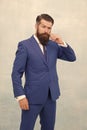 Office style. Business attire. Fashion wardrobe. Menswear store. Get exclusive formalwear. Bearded man blue suit. Mature Royalty Free Stock Photo