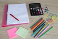 Office supplies, business accessories with color pencils and notebook on wooden table Royalty Free Stock Photo