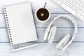 Office Supplies. Top View of Opened Notebook, Pen, Keyboard, Headphones and Cup of Coffee. 3d Rendering Royalty Free Stock Photo