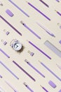 Office supplies violet color, pencils, pens, paper clips, erasers as graphic pattern. School stationery flat lay on Royalty Free Stock Photo