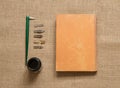 Office supply collection - calligraphy pens with ink on brown Royalty Free Stock Photo