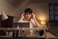 office syndrome concept Asian freelancer feeling stressed and having headache during nightshift Royalty Free Stock Photo