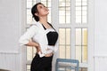 Office syndrome concept. Businesswoman twisting the body to relieve fatigue , suffering from pain after sedentary working in