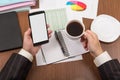 Office table with accessories, folders and documents, cup of coffee Royalty Free Stock Photo