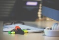 Office table background with phone, headphones and computer keyboard. Business workplace or workspace concept. Top view from above Royalty Free Stock Photo