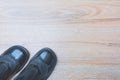 Office table with business shoes. View from above