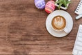 Office table with notebook, computer keyboard, mouse, cup of coffee, tablet pc and smartphone, Top view with copy space Royalty Free Stock Photo