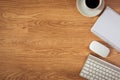 Office table with notepad, computer and coffee cup and computer