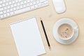 Office table with notepad, computer and coffee cup Royalty Free Stock Photo